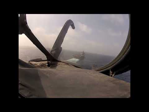Landing on a Carrier in the day and night.