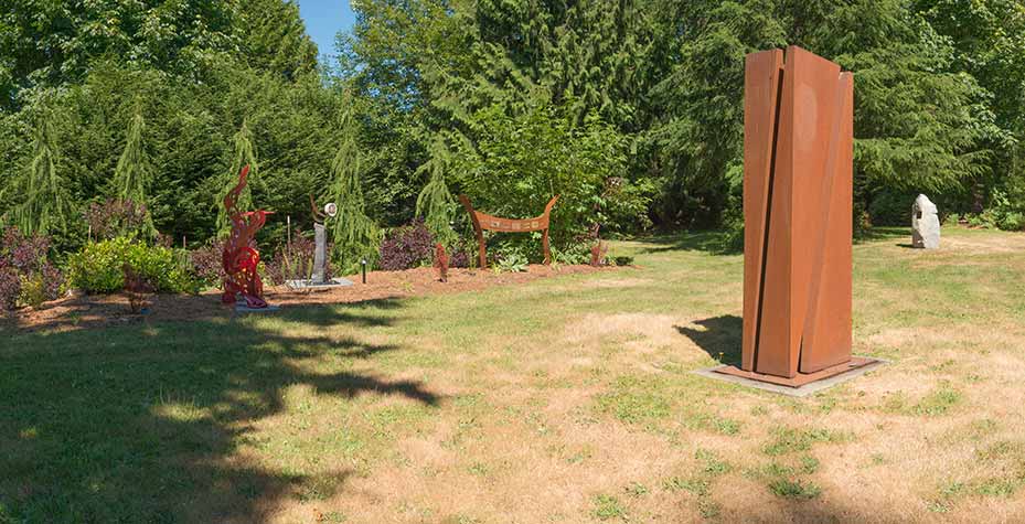 The Matzke outdoor art gallery on Camano island featuring statues of many different types.