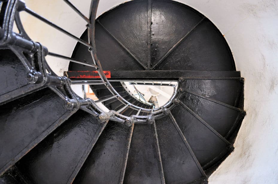 The spiral staircase looks up from the bottom.