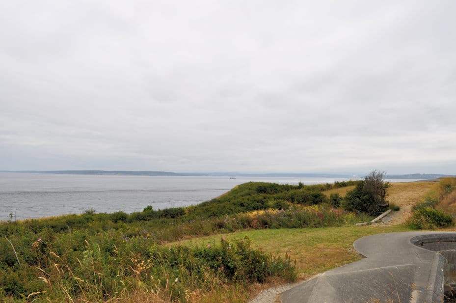 A cloudy day view from Fort Casey shows the gray water of Admiralty Inlet