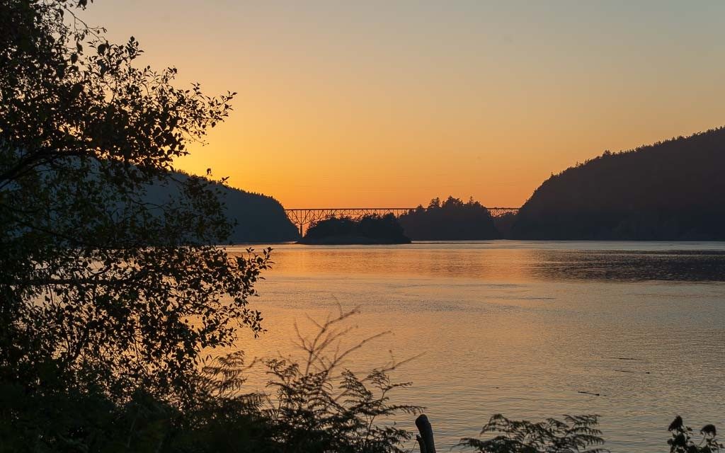The sun setting at Deception Pass as seen from the Hoypus Point Trail.
