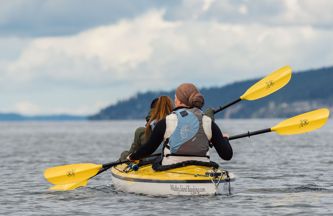 Two people in a kayak.