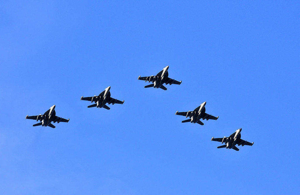 5 jets in a "V" formation in mid-air.