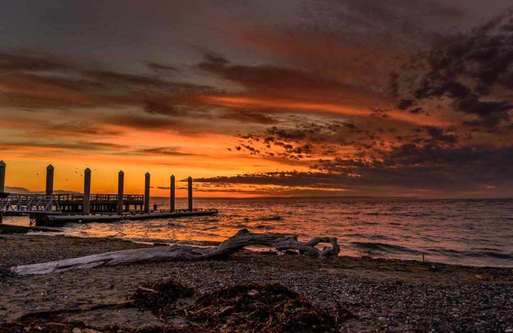 The Bush Point Boat Launch with a dramatic sunset.