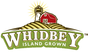 Logo says Whidbey Island Grown and there is a drawing of a field, a barn, and a lighthouse
