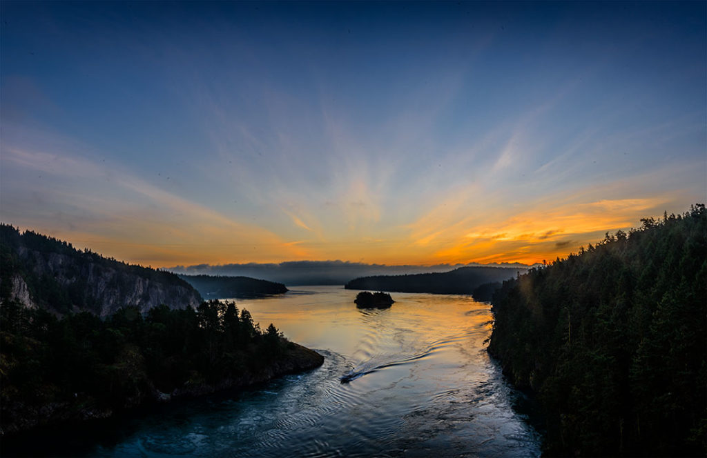 Sun rising at Deception Pass as seen from the bridge.