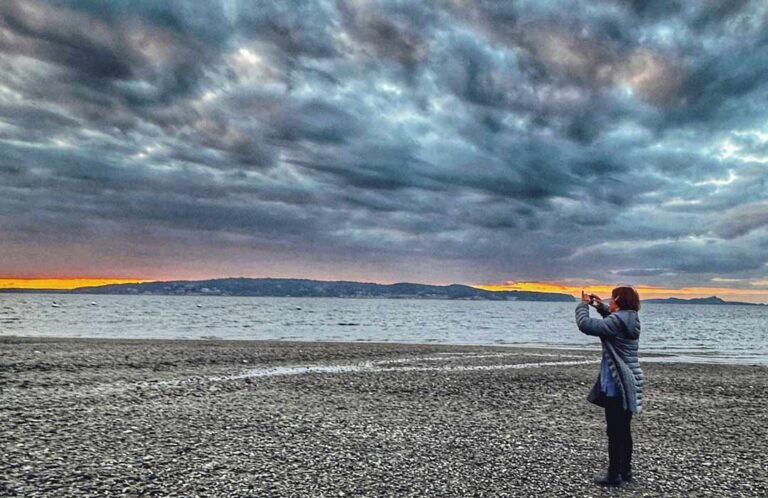 Woman on stormy Camano Beach