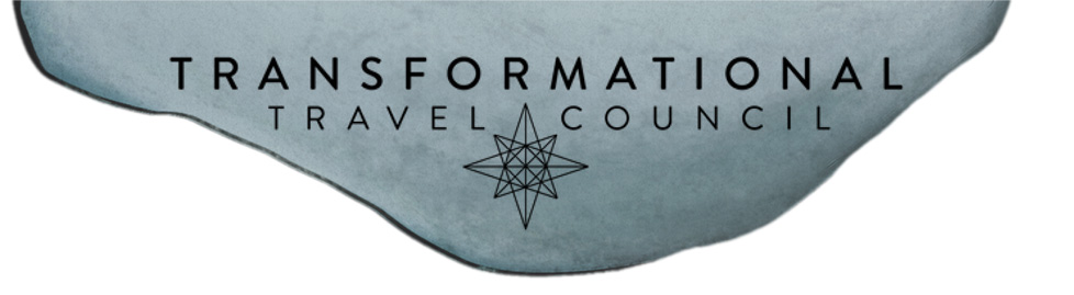 Drawing depicting a flat stone with the words Transformational Travel Council on it.