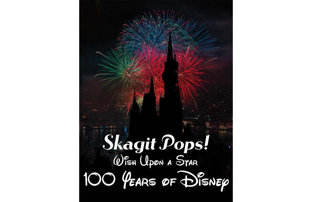 Poster of fireworks behind a silhouette of a Castle with the words "Skagit Pops, Wish Upon a Star, 100 years of Disney"