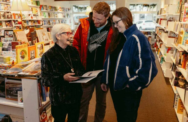 A couple looking at books at Moonraker books in Langley