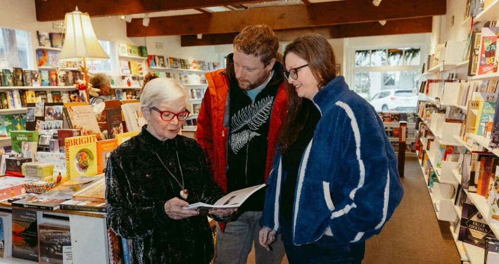 A couple looking at books at Moonraker books in Langley