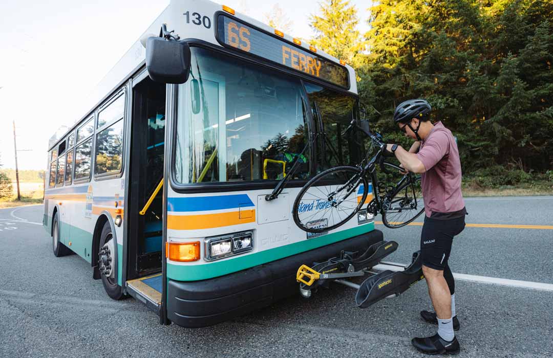 Bike being loaded onto an Island Transit Bus