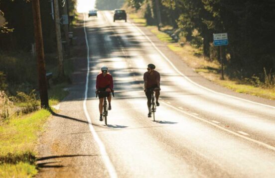 2 people biking on the island