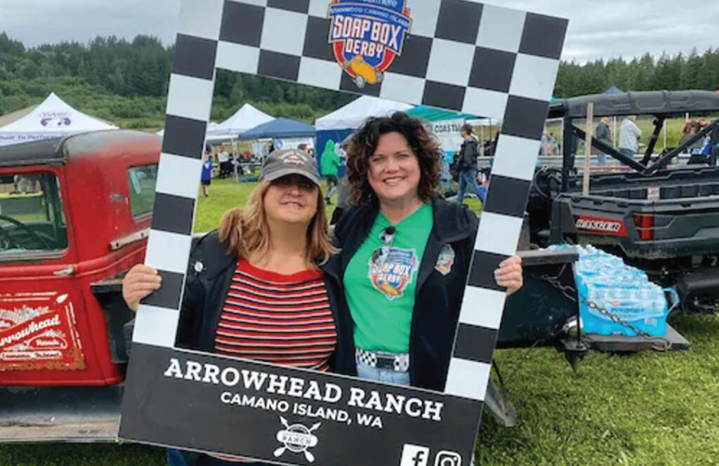 Sosp Box Derby hat Arrowhead Ranch 2 people in a winners frame